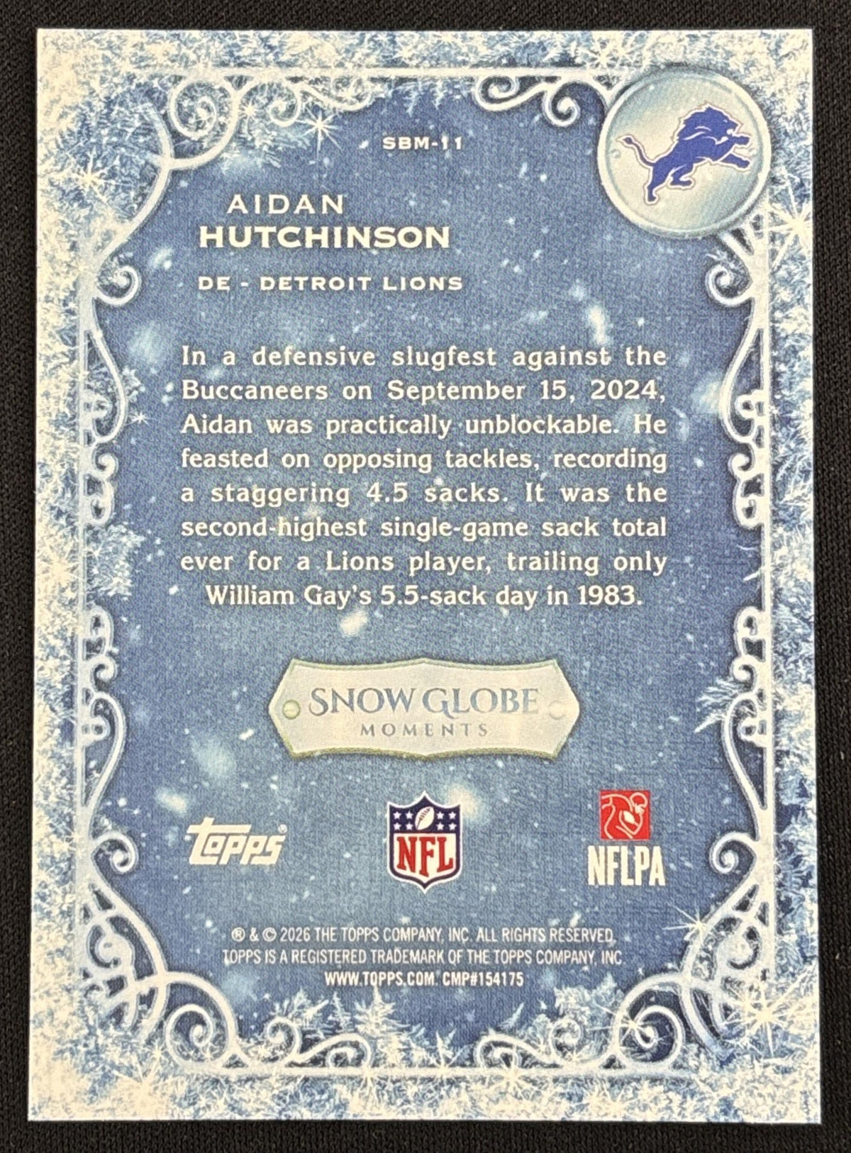 Aidan Hutchinson 2026 Topps Holiday Snow Globe Moments Lions Sports Trading Card