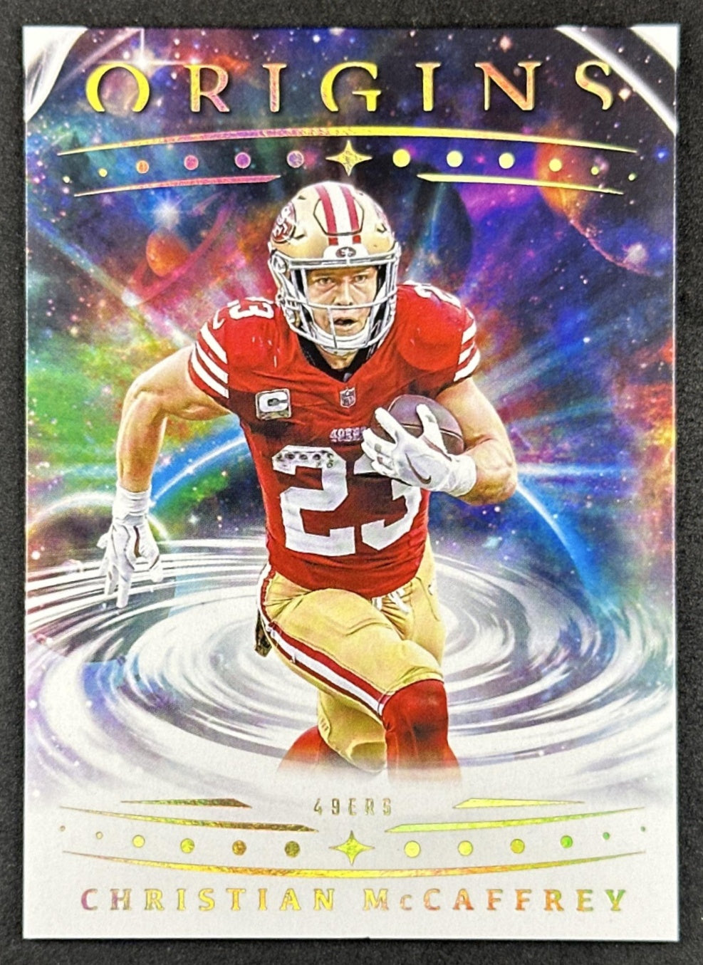 Christian McCaffrey 2025 Panini Origins Orange /149 49ers