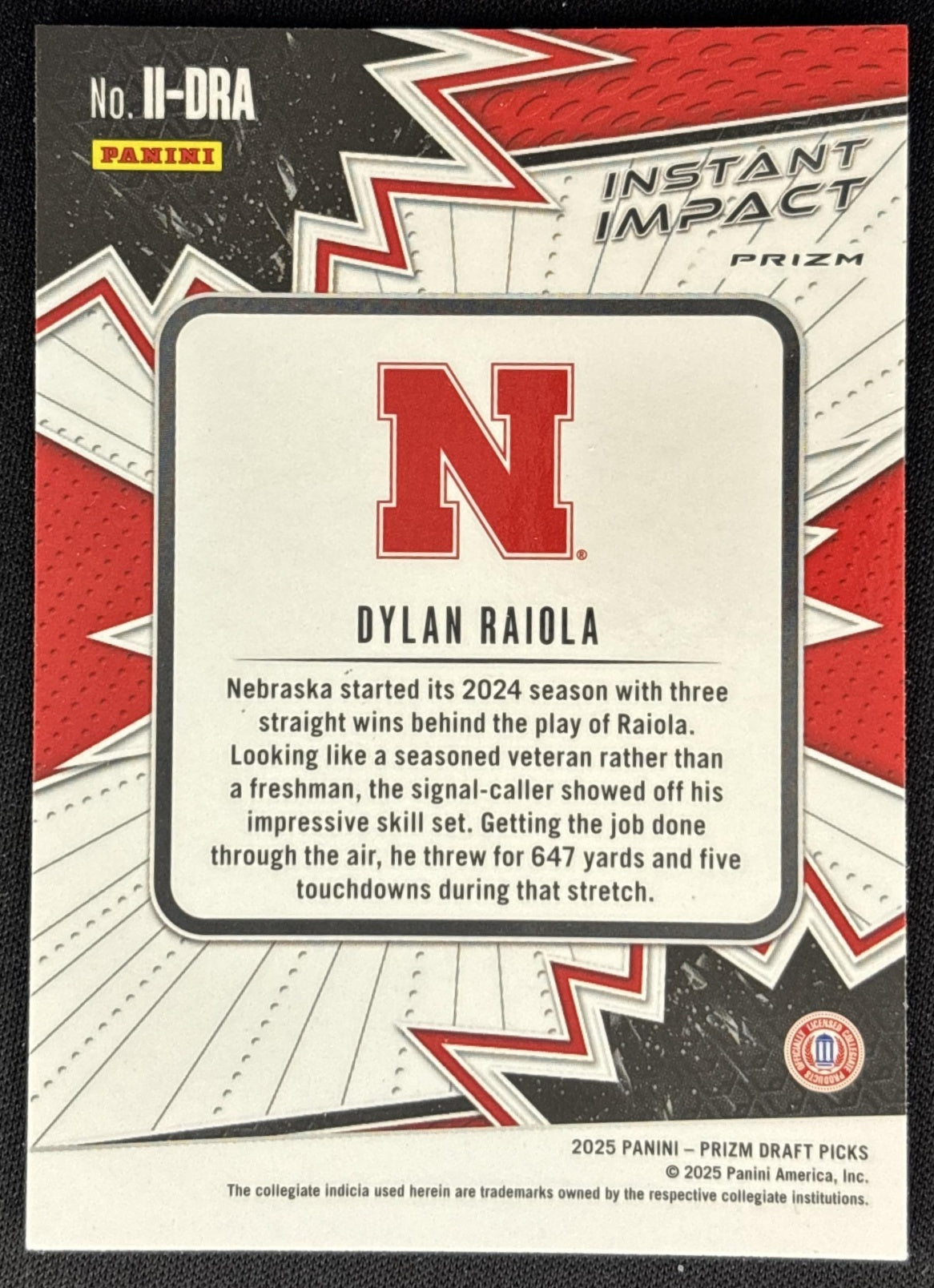 Dylan Raiola 2025 Panini Prizm Draft Picks Instant Impact Red Ice Cornhuskers back