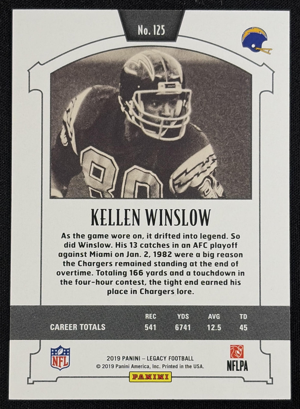 Back of Kellen Winslow 2019 Panini Legacy Red /299 Chargers sports trading card
