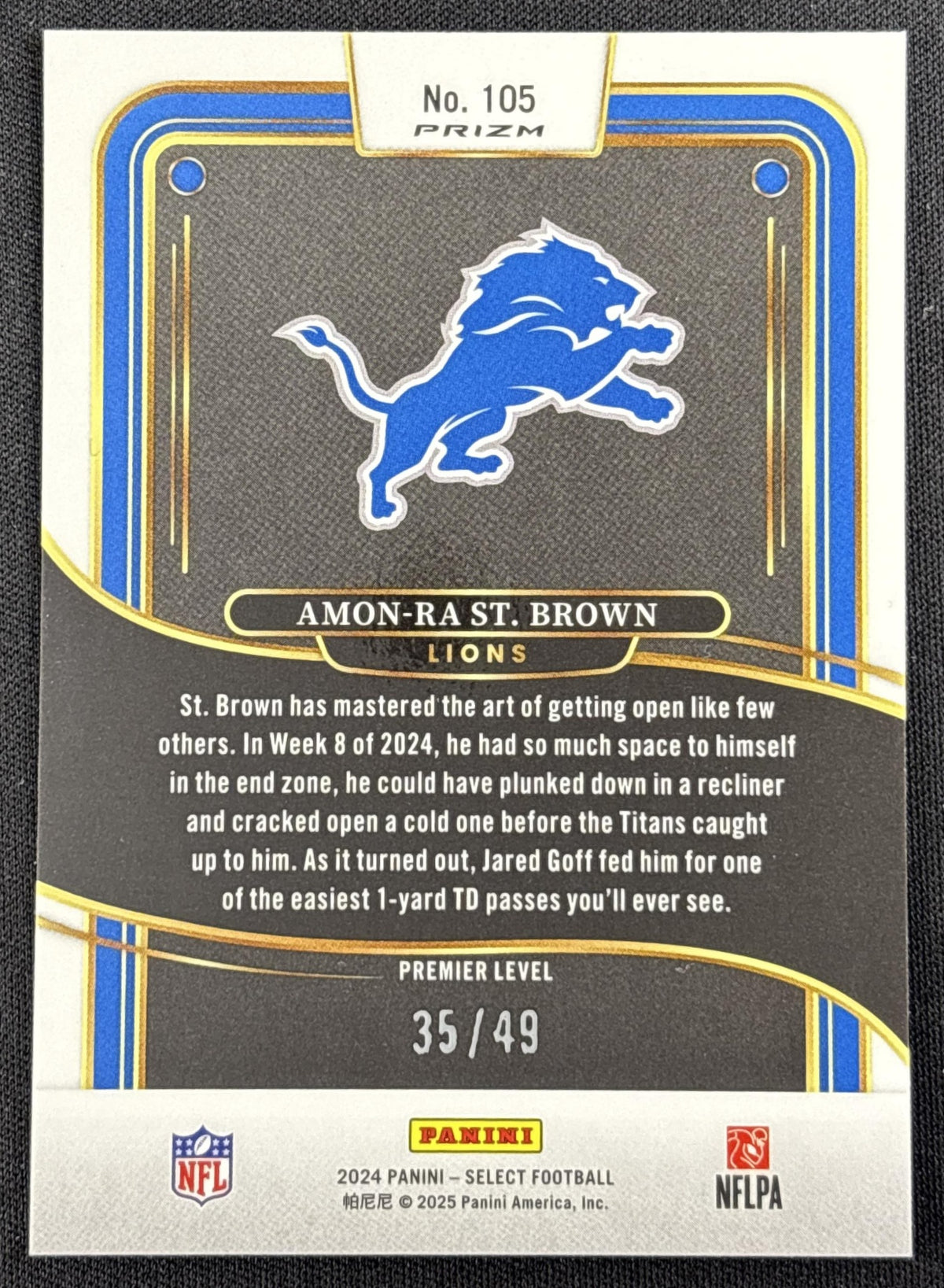 Amon-Ra St. Brown 2024 Panini Select Premier Red Disco Prizm /49 Lions