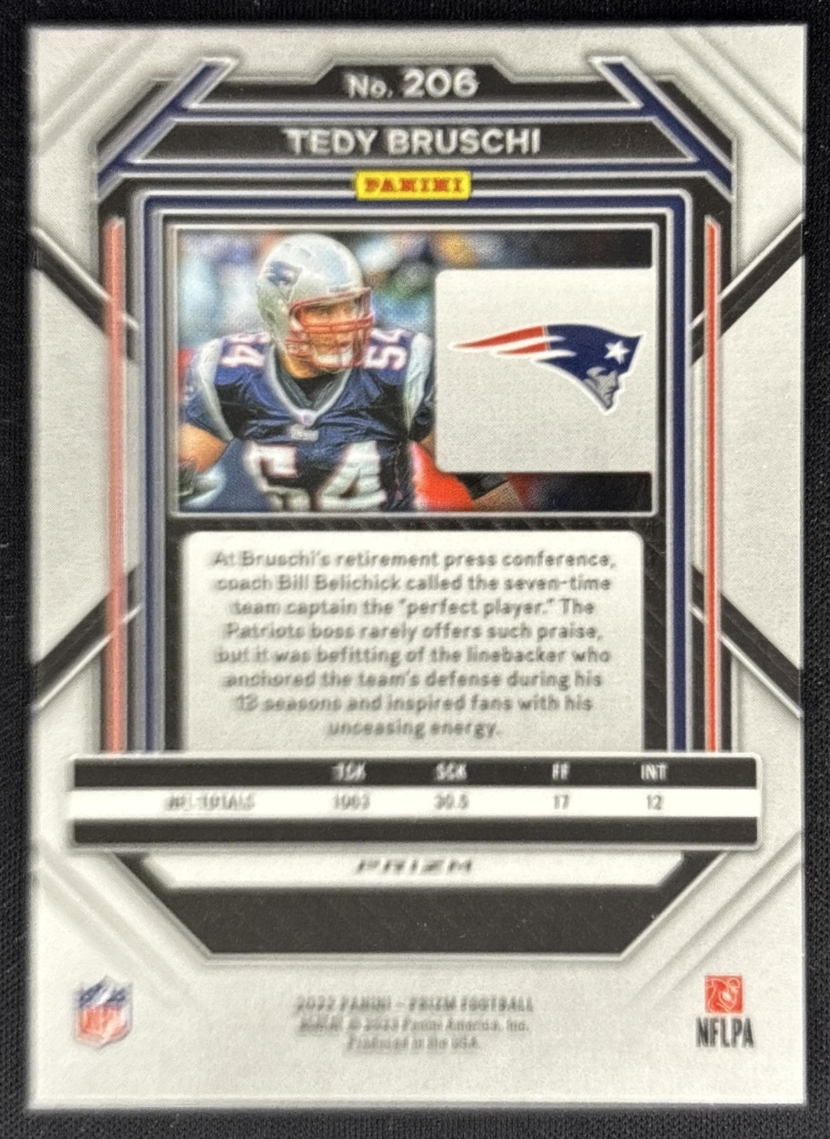 Tedy Bruschi 2022 Panini Prizm Orange Ice Patriots back