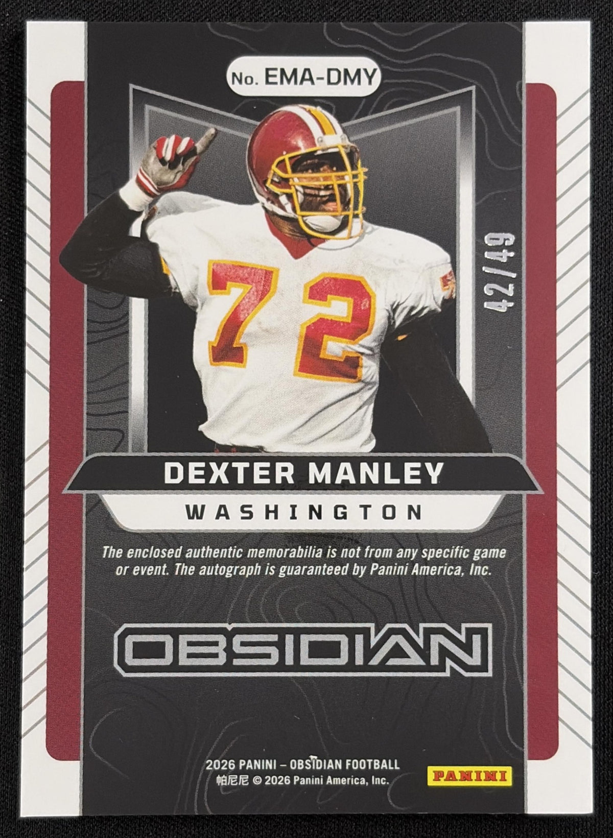Dexter Manley 2026 Panini Obsidian Eruption Material Auto Blue /49 Redskins Sports Trading Card