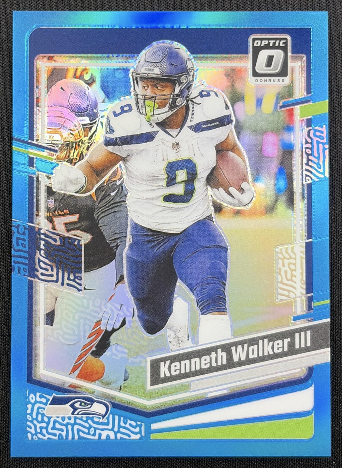 Kenneth Walker III 2023 Panini Donruss Optic Aqua Prizm /299 Seahawks