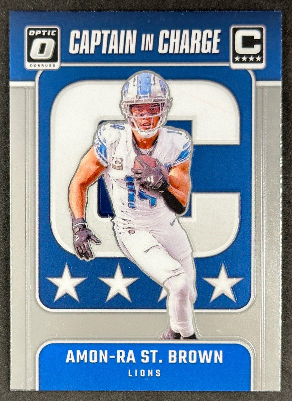Amon-Ra St. Brown 2024 Donruss Optic Captain In Charge Lions Sports Trading Card