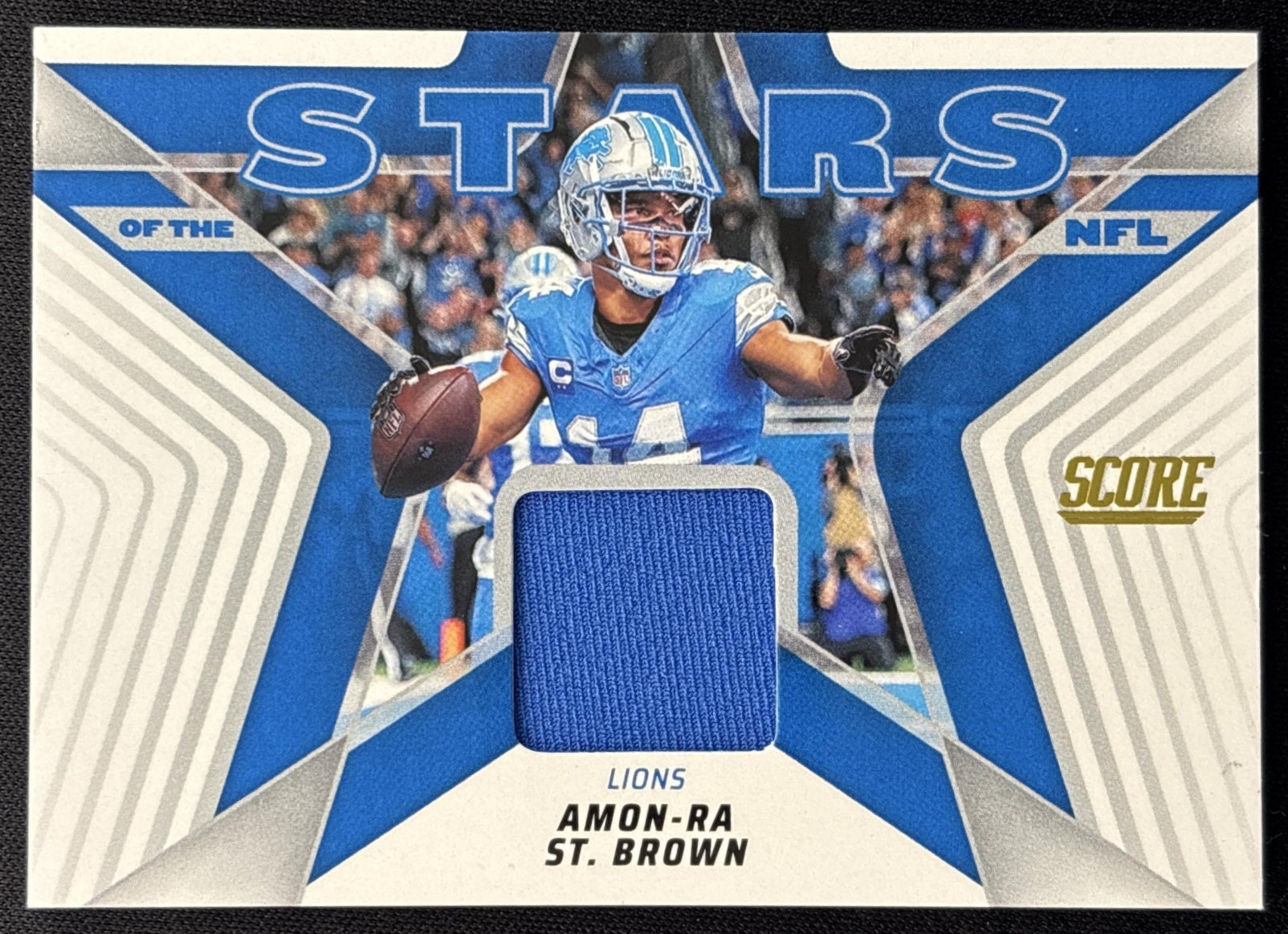 Amon-Ra St. Brown 2025 Panini Score Stars of the NFL Jersey Lions front