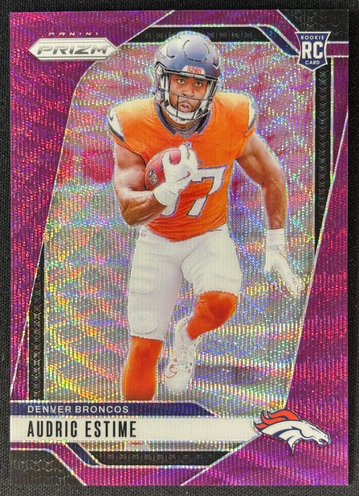 Front of Audric Estime 2024 Prizm Purple Wave /99 Broncos sports trading card