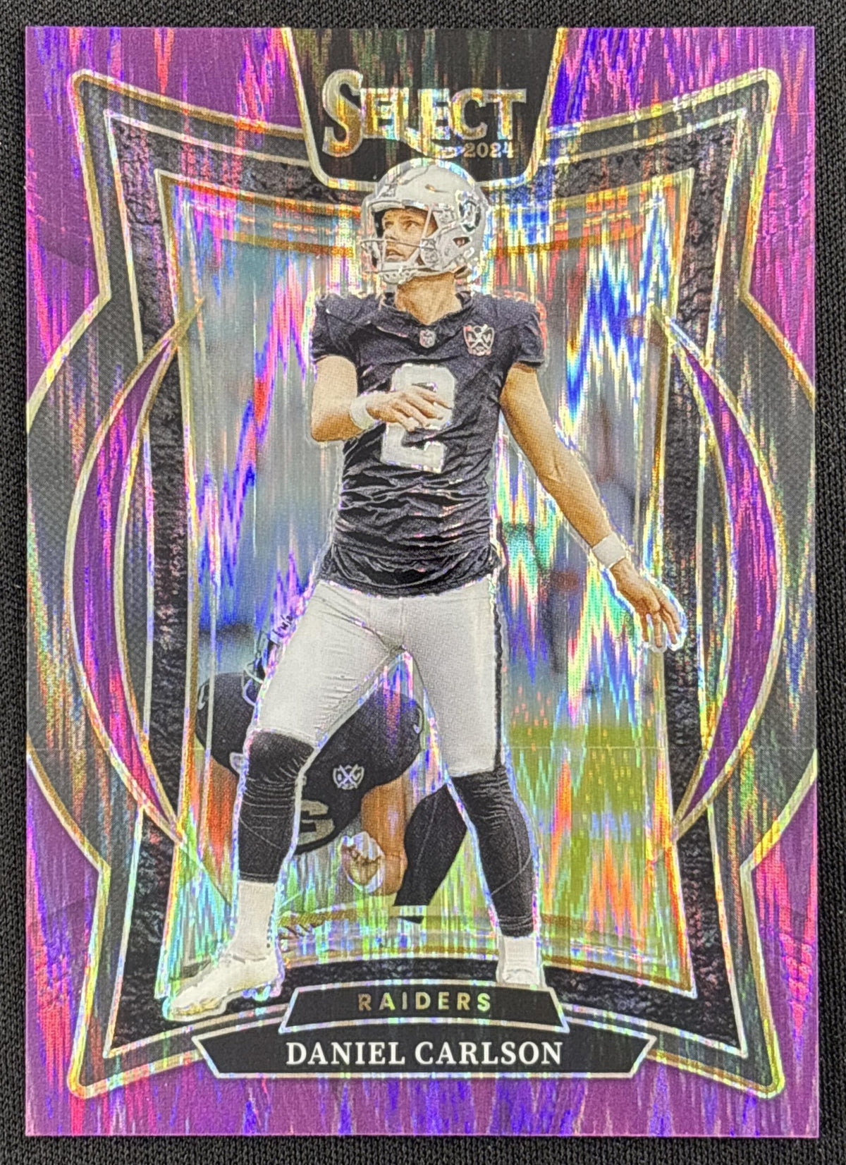 Daniel Carlson 2024 Panini Select Concourse Purple Prizm Shock /360 Raiders