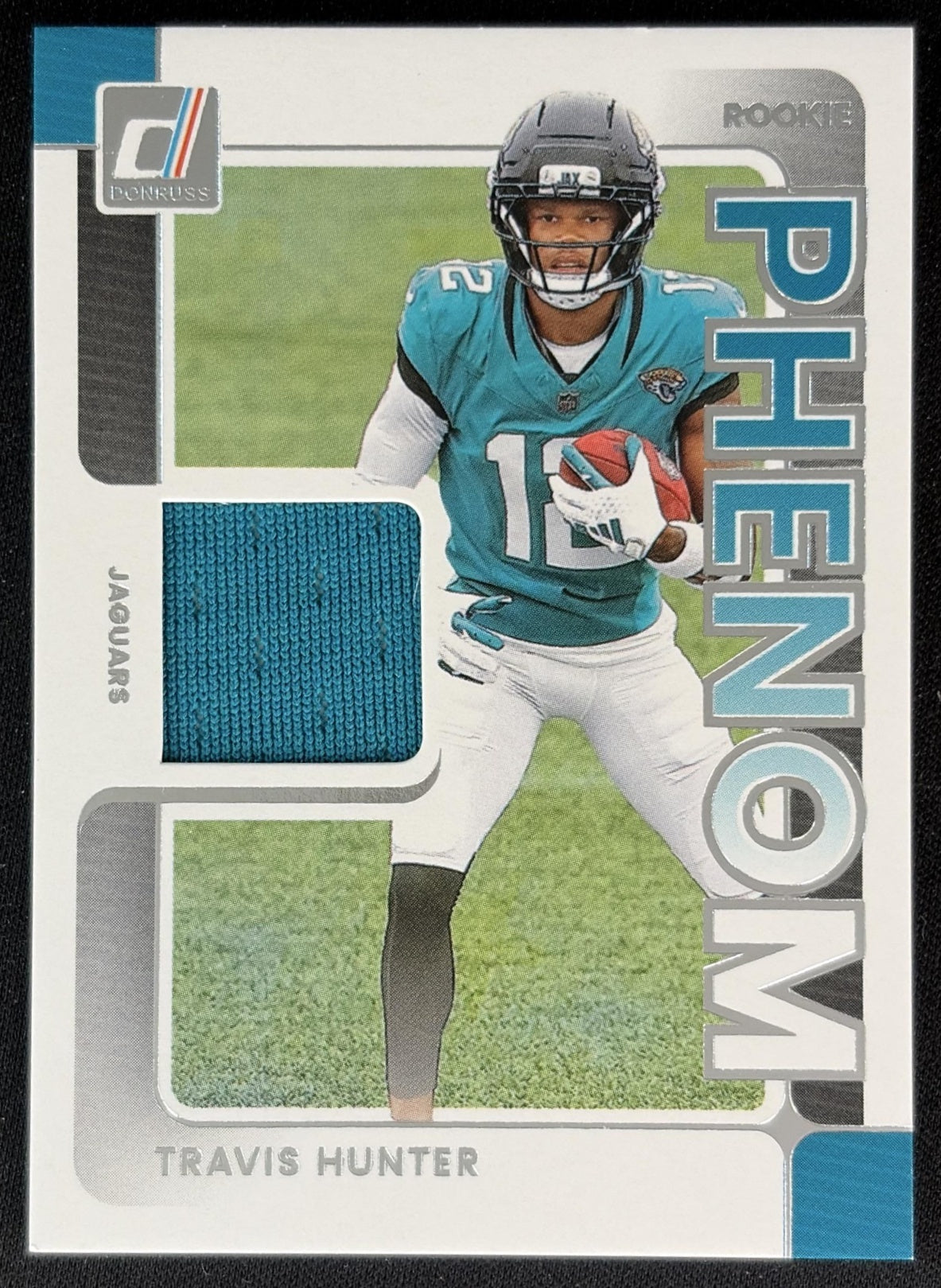 Travis Hunter 2025 Panini Donruss Rookie Phenom Jerseys Jaguars front