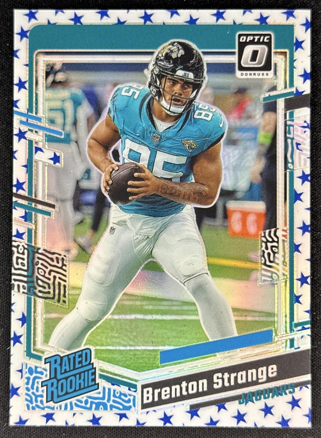 Brenton Strange 2023 Panini Donruss Optic Blue Stars Prizm Jaguars front