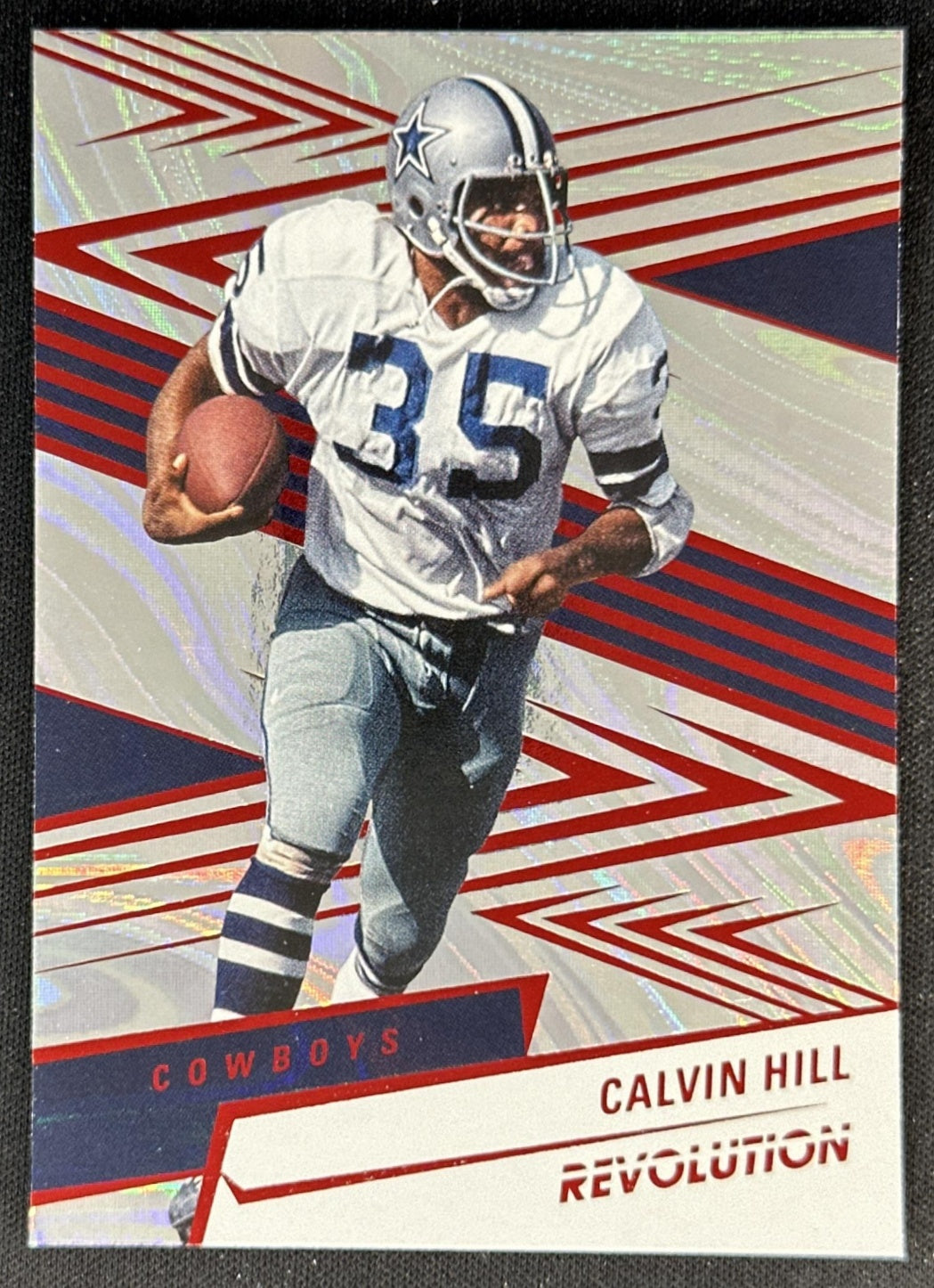 Calvin Hill 2025 Panini Revolution Red Swirl Cowboys