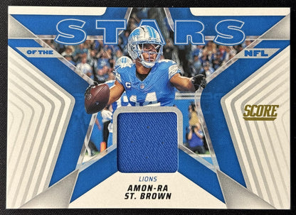 Amon-Ra St. Brown 2025 Panini Score Stars of the NFL Jersey Lions front