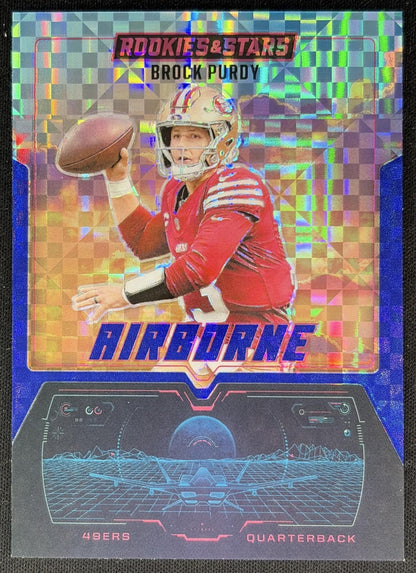 Brock Purdy 2025 Panini Rookies & Stars Airborne Blue Plaid 49ers front