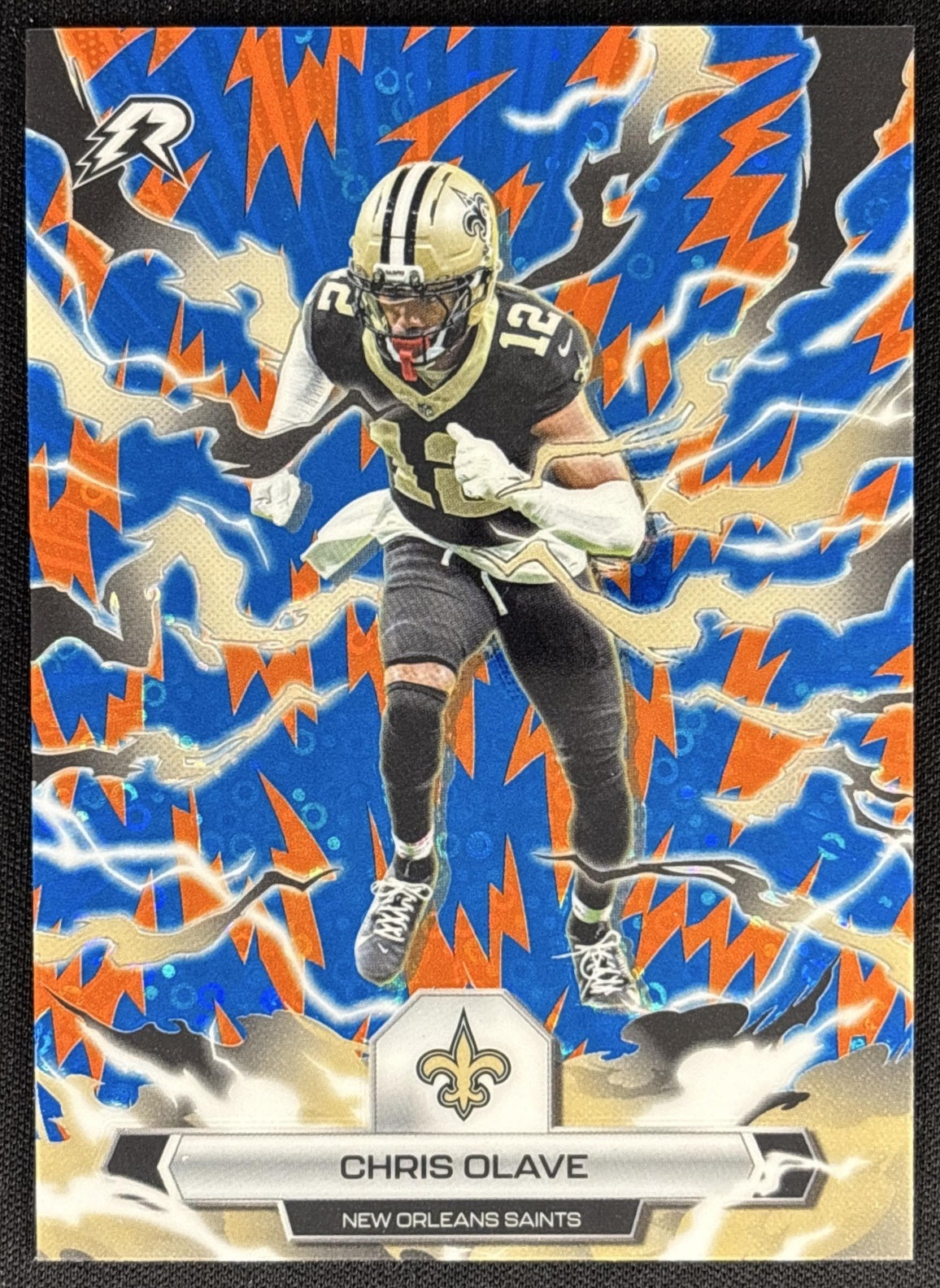 Chris Olave 2025 Topps Resurgence Blue and Orange Spark Refractor Saints