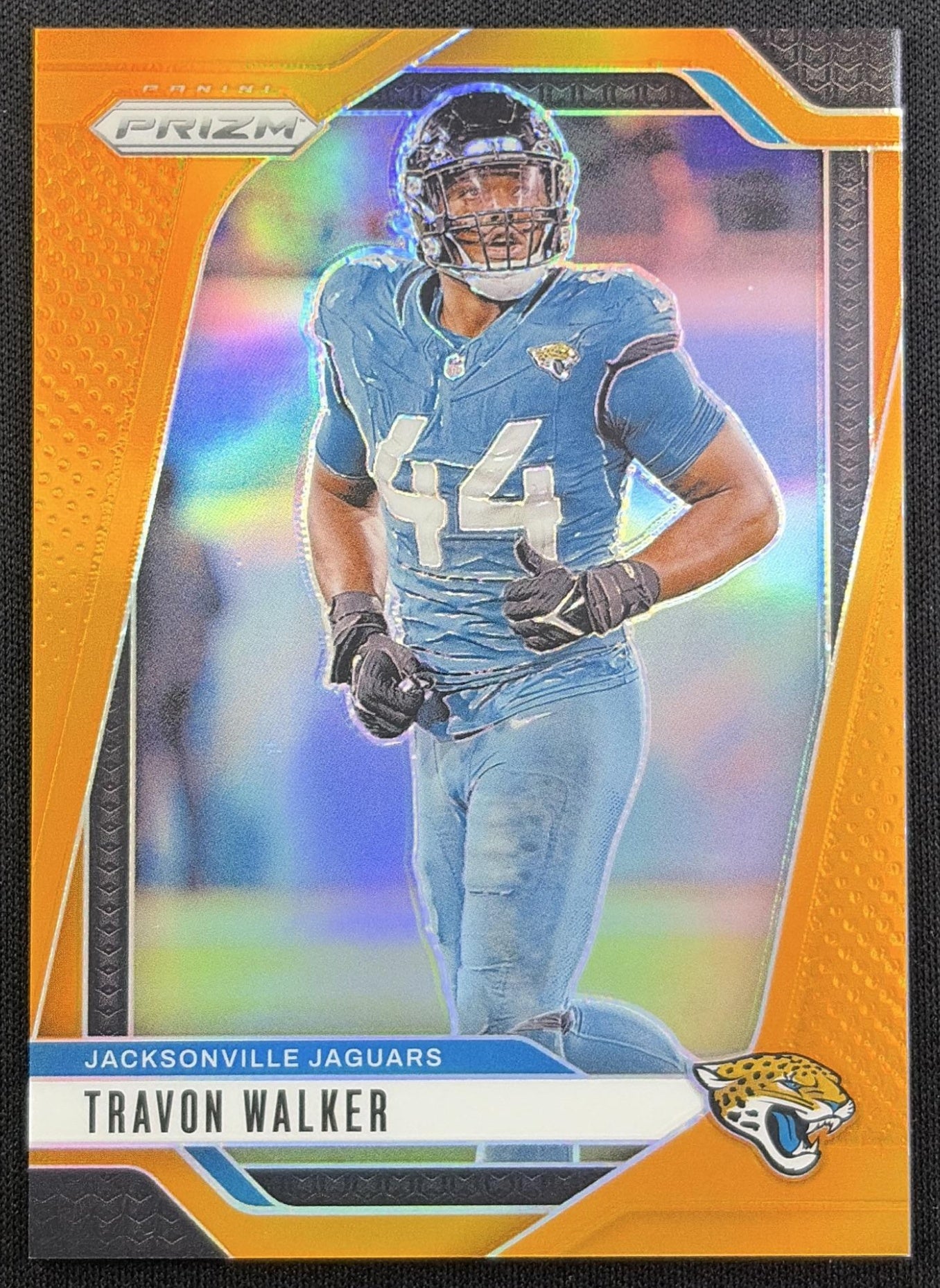 Travon Walker 2024 Panini Prizm Orange /249 Jaguars front