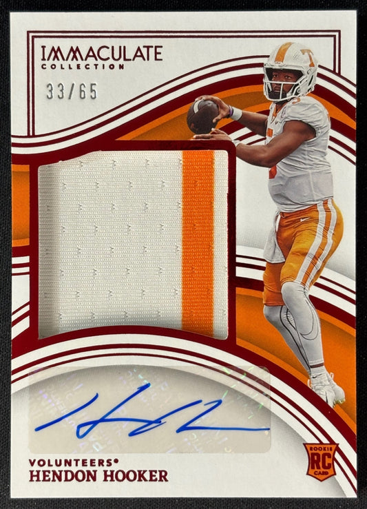 Front of Hendon Hooker 2023 Immaculate Collection Collegiate Rookie Patch Auto Ruby /65 Volunteers sports trading card