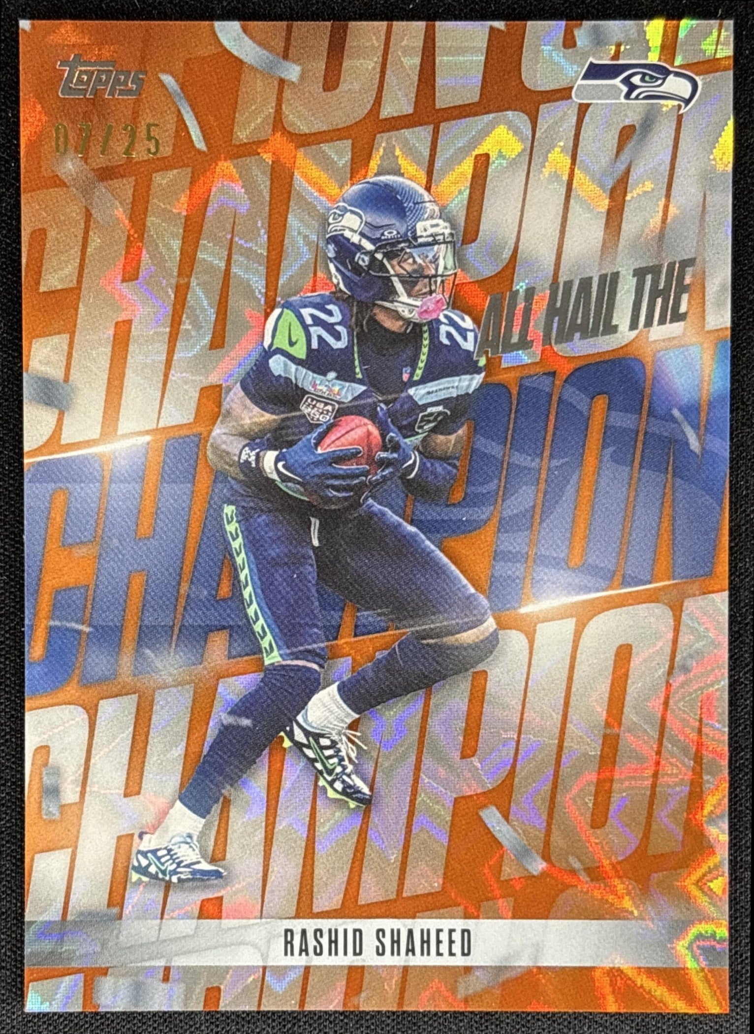 Rashid Shaheed 2026 Topps All Hail The Champ Orange Foil /25 Seahawks