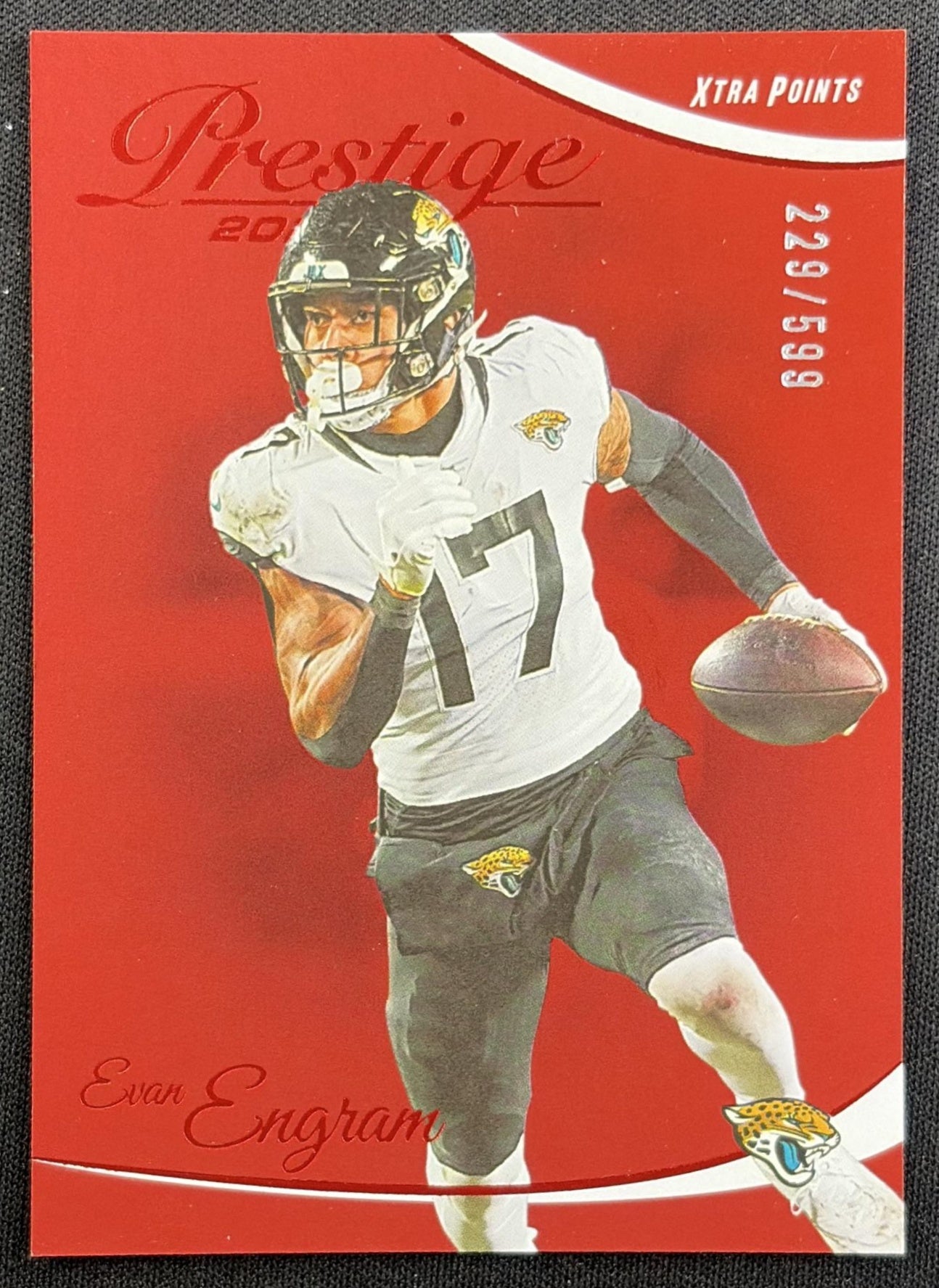 Evan Engram 2023 Panini Prestige Xtra Points Red /599 Jaguars front