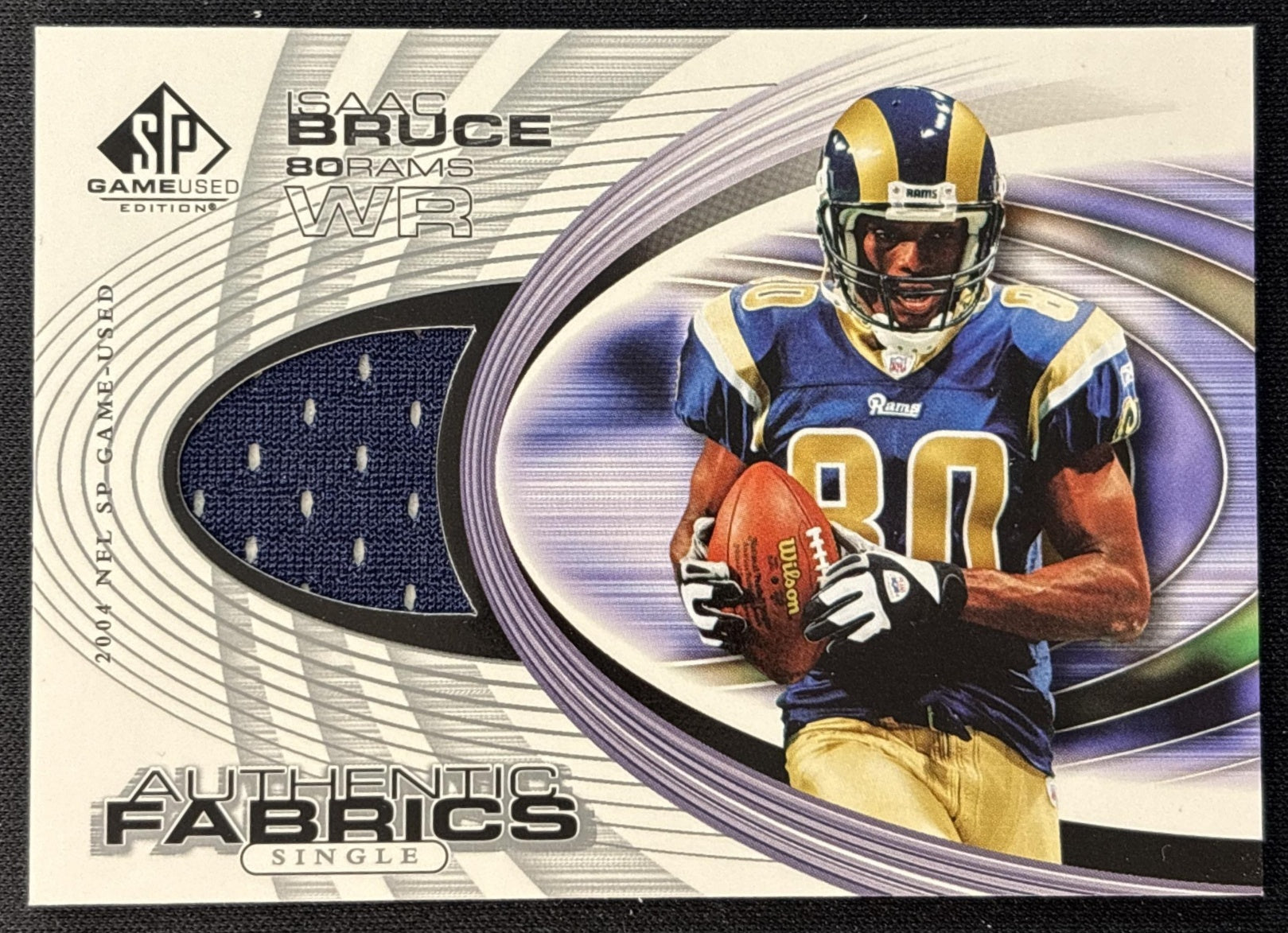 Isaac Bruce 2004 SP Game Used Authentic Fabrics Rams Sports Trading Card