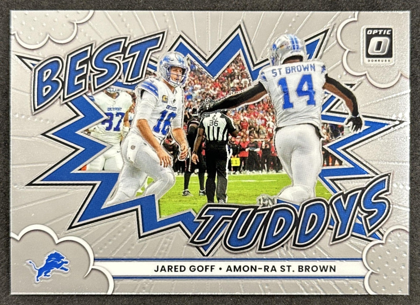 Amon-Ra St. Brown Jared Goff 2025 Panini Donruss Optic Best Tuddys Lions front
