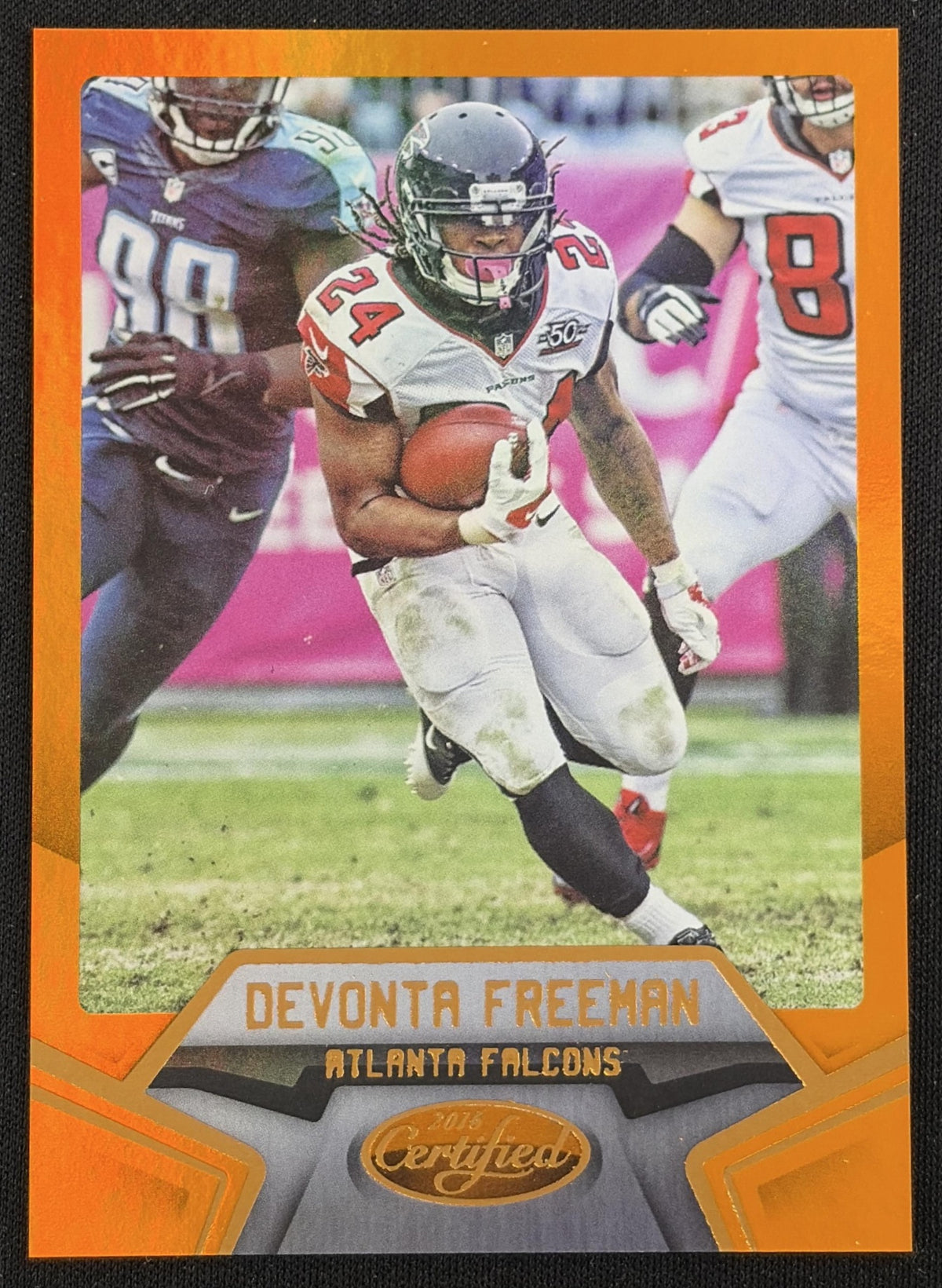 Front of Devonta Freeman 2016 Panini Certified Mirror Orange /225 Falcons sports trading card