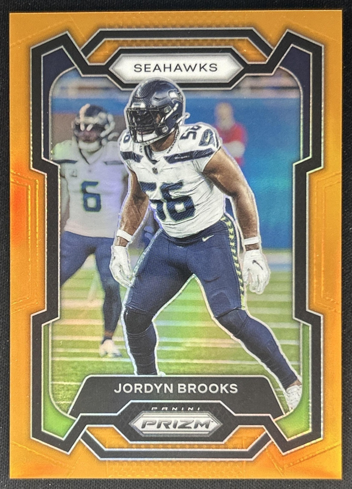 Jordyn Brooks 2023 Panini Prizm Orange /249 Seahawks front