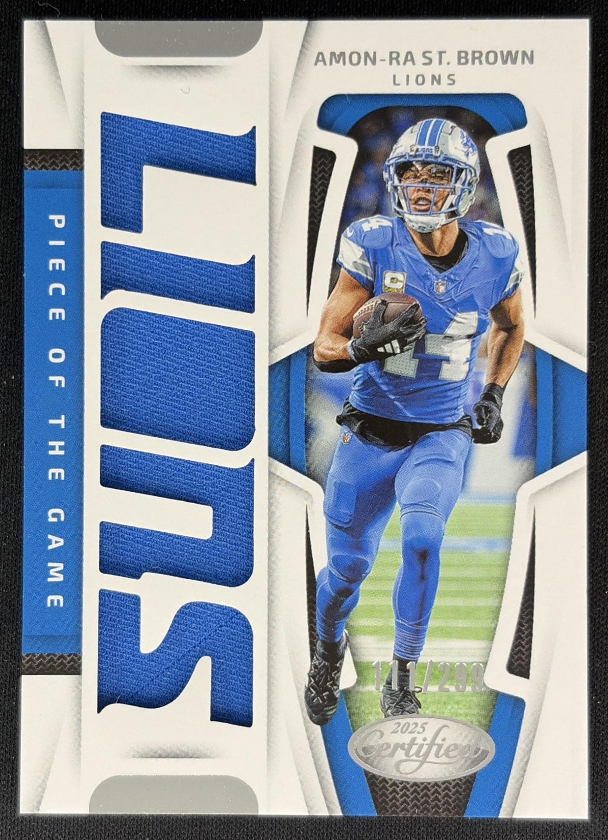 Amon-Ra St. Brown 2025 Panini Certified Piece of the Game /299 Lions Sports Trading Cards