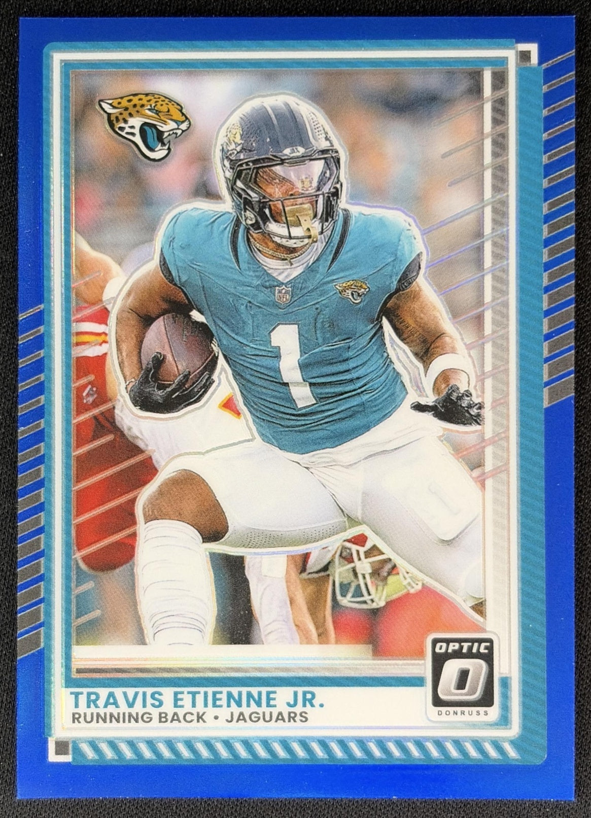 Travis Etienne Jr. 2025 Panini Donruss Optic Blue Prizm /249 Jaguars front
