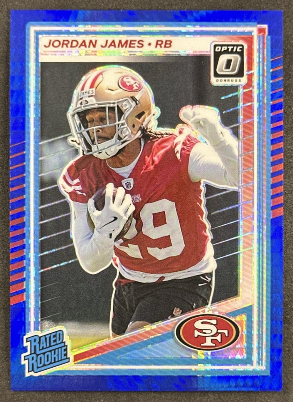 Jordan James 2025 Panini Donruss Optic Rated Rookie Blue Hyper Prizm 49ers front sports trading card