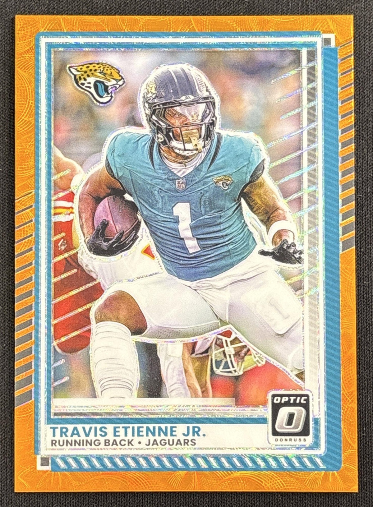 Travis Etienne Jr. 2025 Panini Donruss Optic Orange Scope Prizm /79 Jaguars