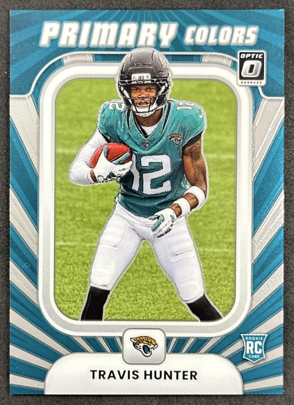 Travis Hunter 2025 Panini Donruss Optic Rookie Primary Colors Jaguars front
