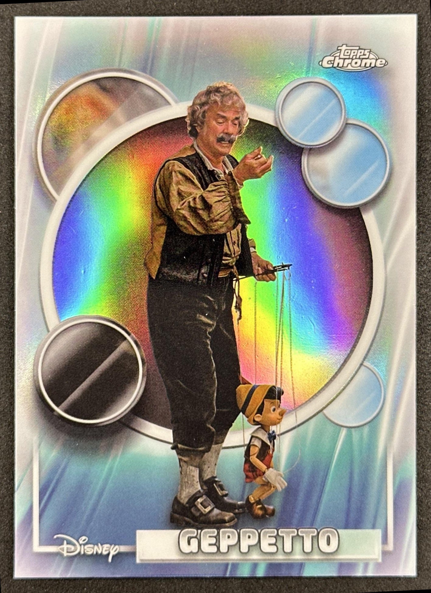 Geppetto 2026 Topps Chrome Disney Refractor Pinocchio 2022 Front