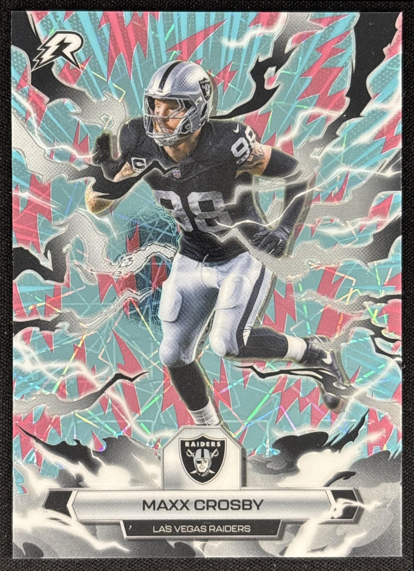 Maxx Crosby 2025 Topps Resurgence Sky Blue and Pink Shock Refractor Raiders front