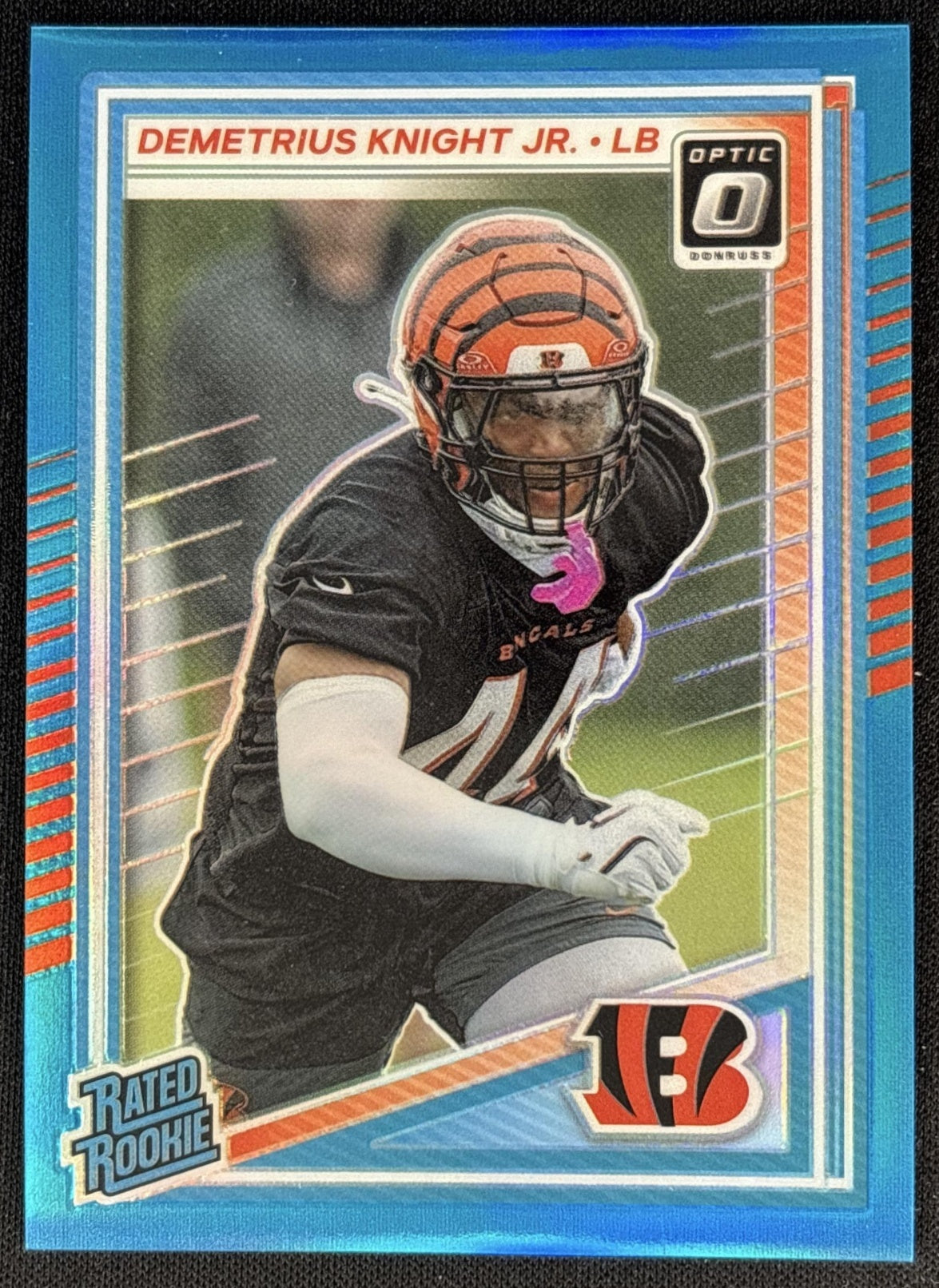Demetrius Knight Jr. 2025 Donruss Optic Rated Rookie Neon Blue Prizm /399 Bengals