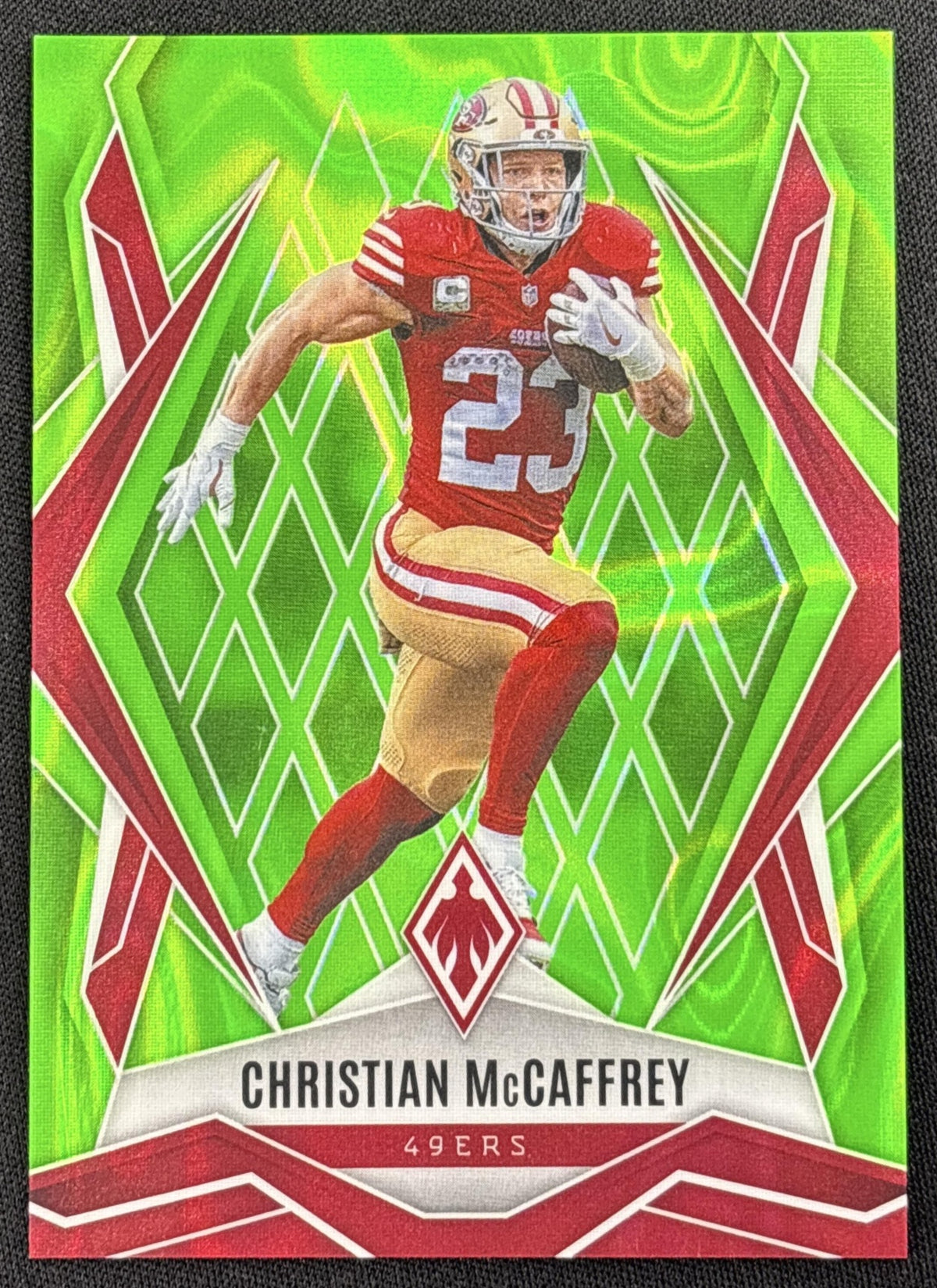 Christian McCaffrey 2025 Panini Phoenix Lime Green Lava Prizm /225 49ers