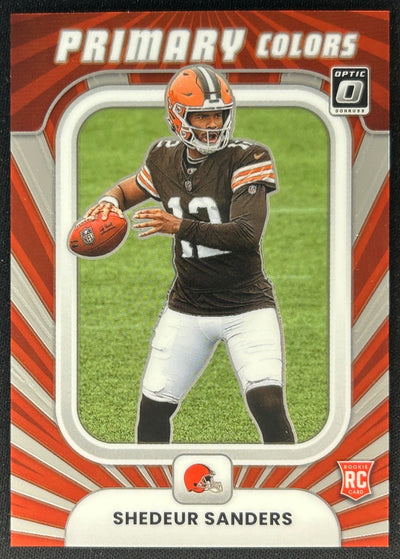 Front of Shedeur Sanders 2025 Donruss Optic Rookie Primary Colors Browns Cleveland Browns