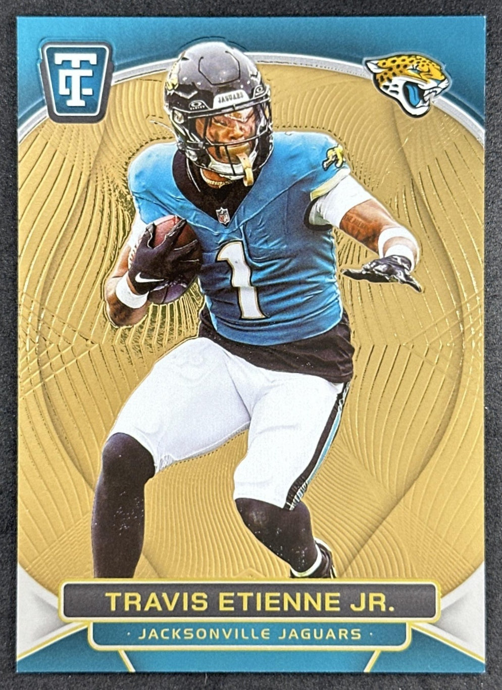 Travis Etienne Jr. 2024 Panini Totally Certified Mirror Neon Orange /399 Jaguars Sports Trading Card