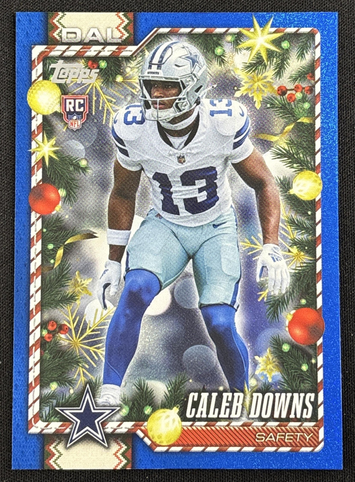 Caleb Downs 2026 Topps Holiday Blue Metallic Glitter Cowboys Sports Trading Card