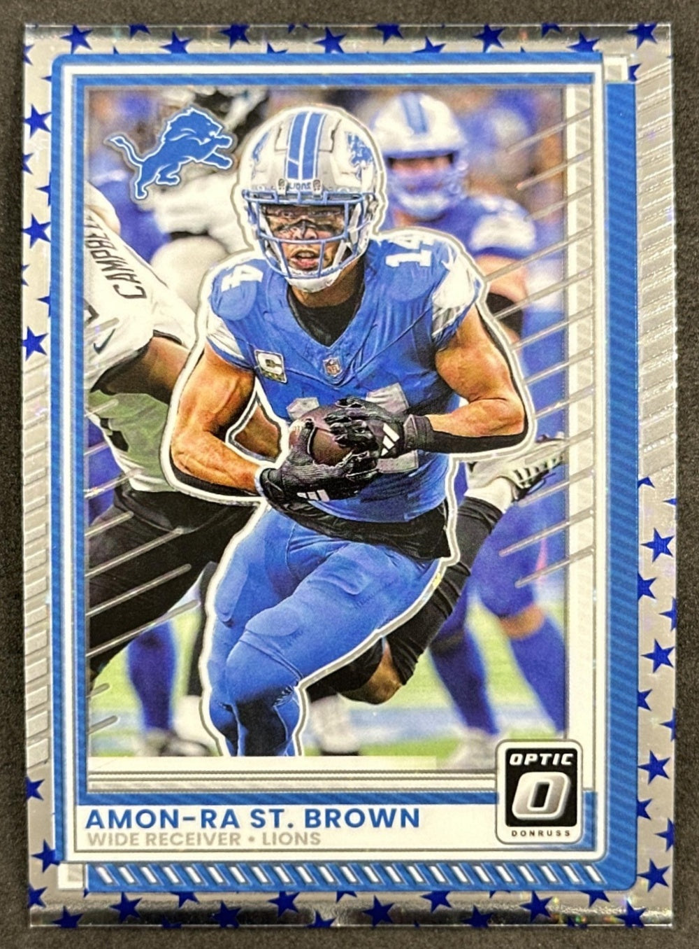 Amon-Ra St. Brown 2025 Panini Donruss Optic Stars Prizm Lions front