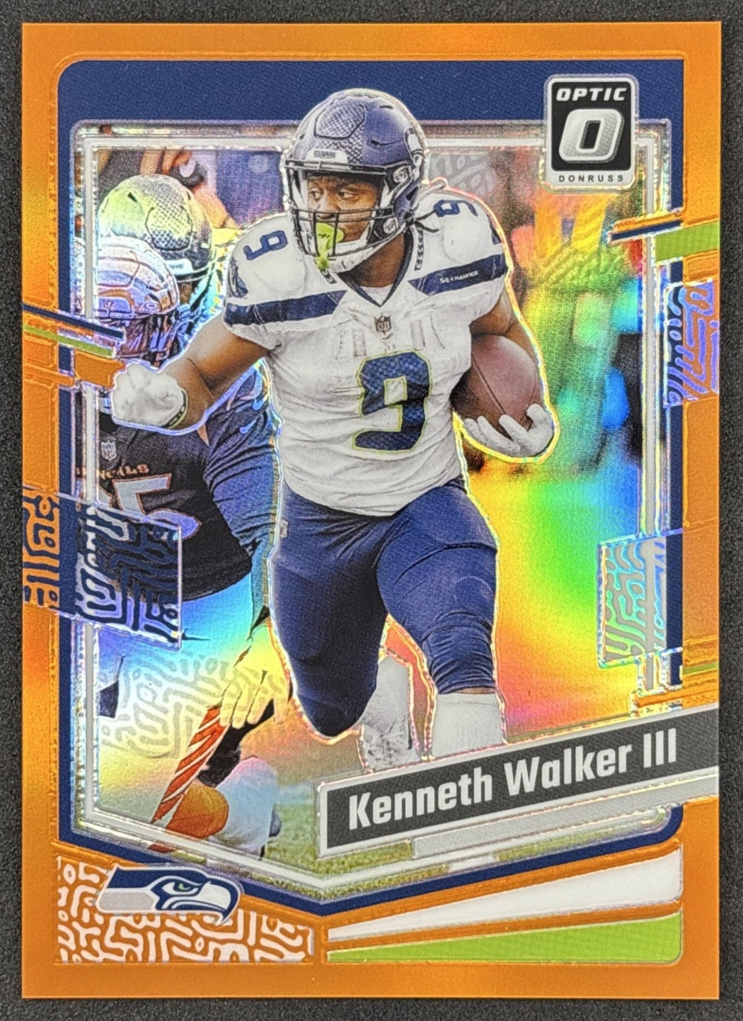 Kenneth Walker III 2023 Panini Donruss Optic Orange Prizm /249 Seahawks front