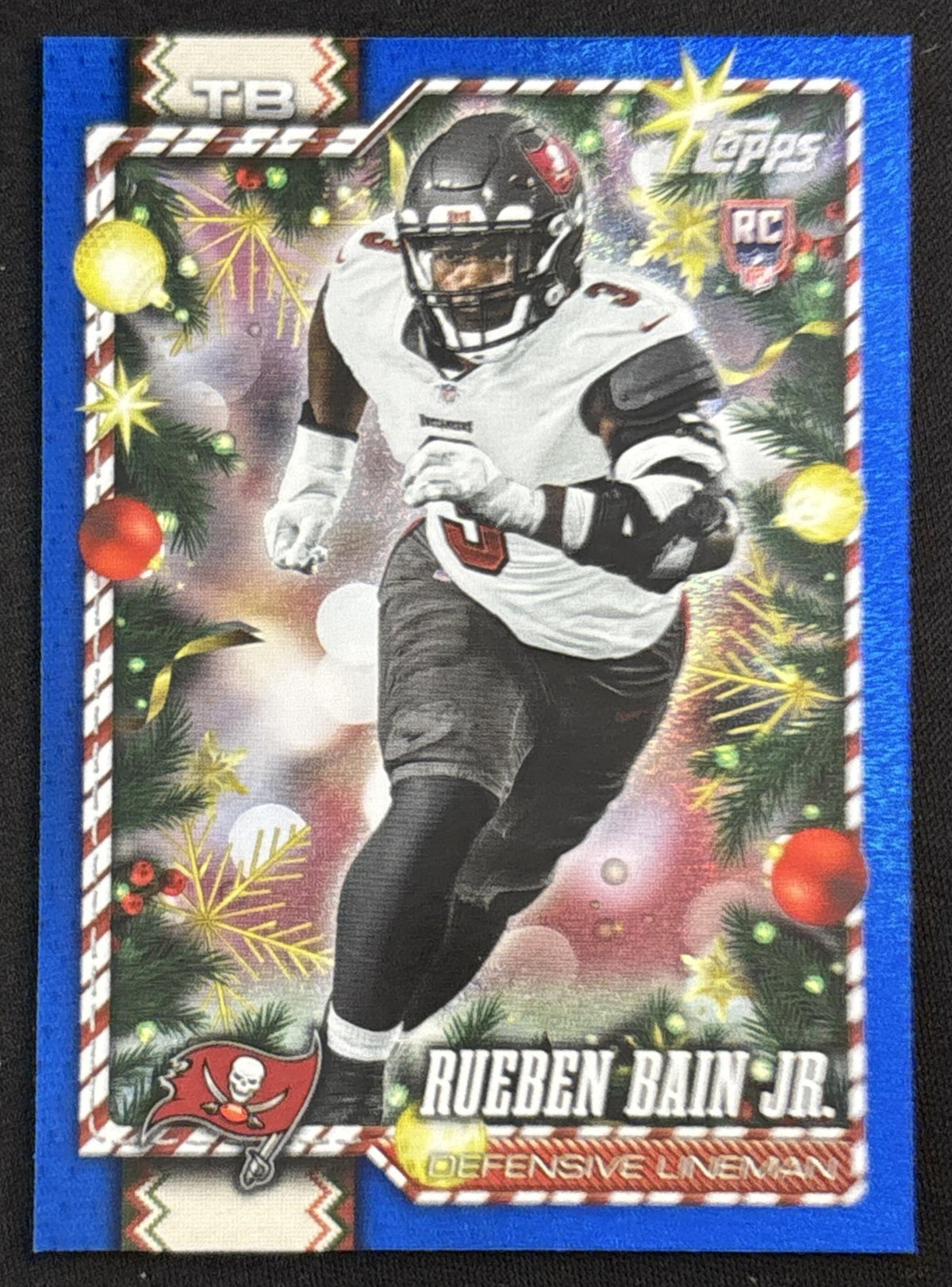 Rueben Bain Jr. 2026 Topps Holiday Blue Metallic Glitter Buccaneers