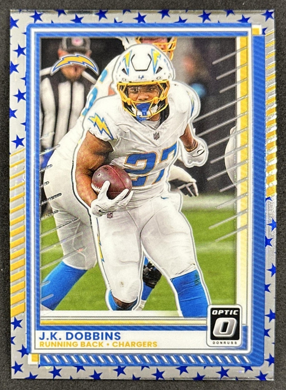 J.K. Dobbins 2025 Panini Donruss Optic Stars Prizm Chargers Default Title Sports Trading Cards