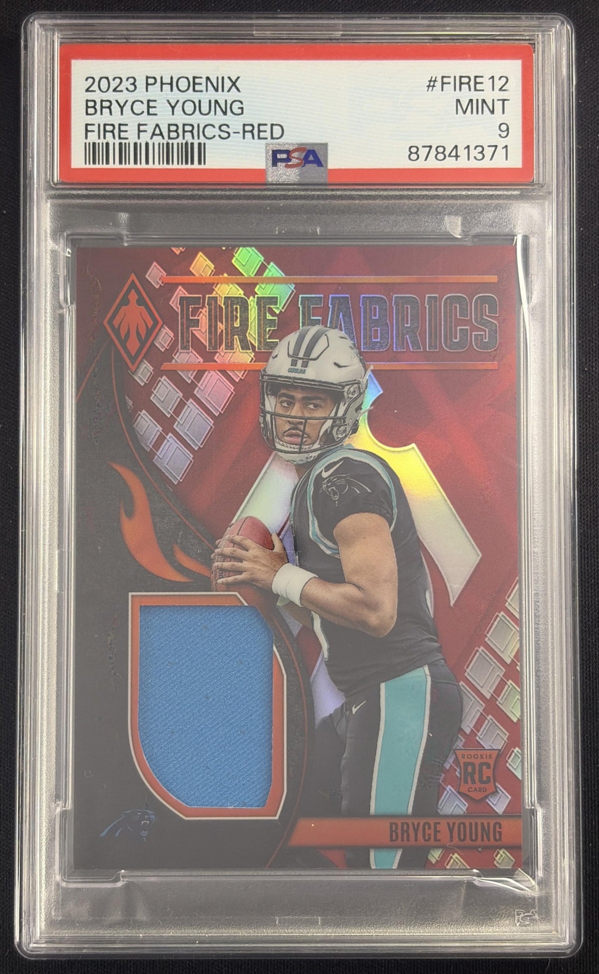 Bryce Young 2023 Panini Phoenix Fire Fabrics Red /75 PSA 9 Panthers Sports Trading Card