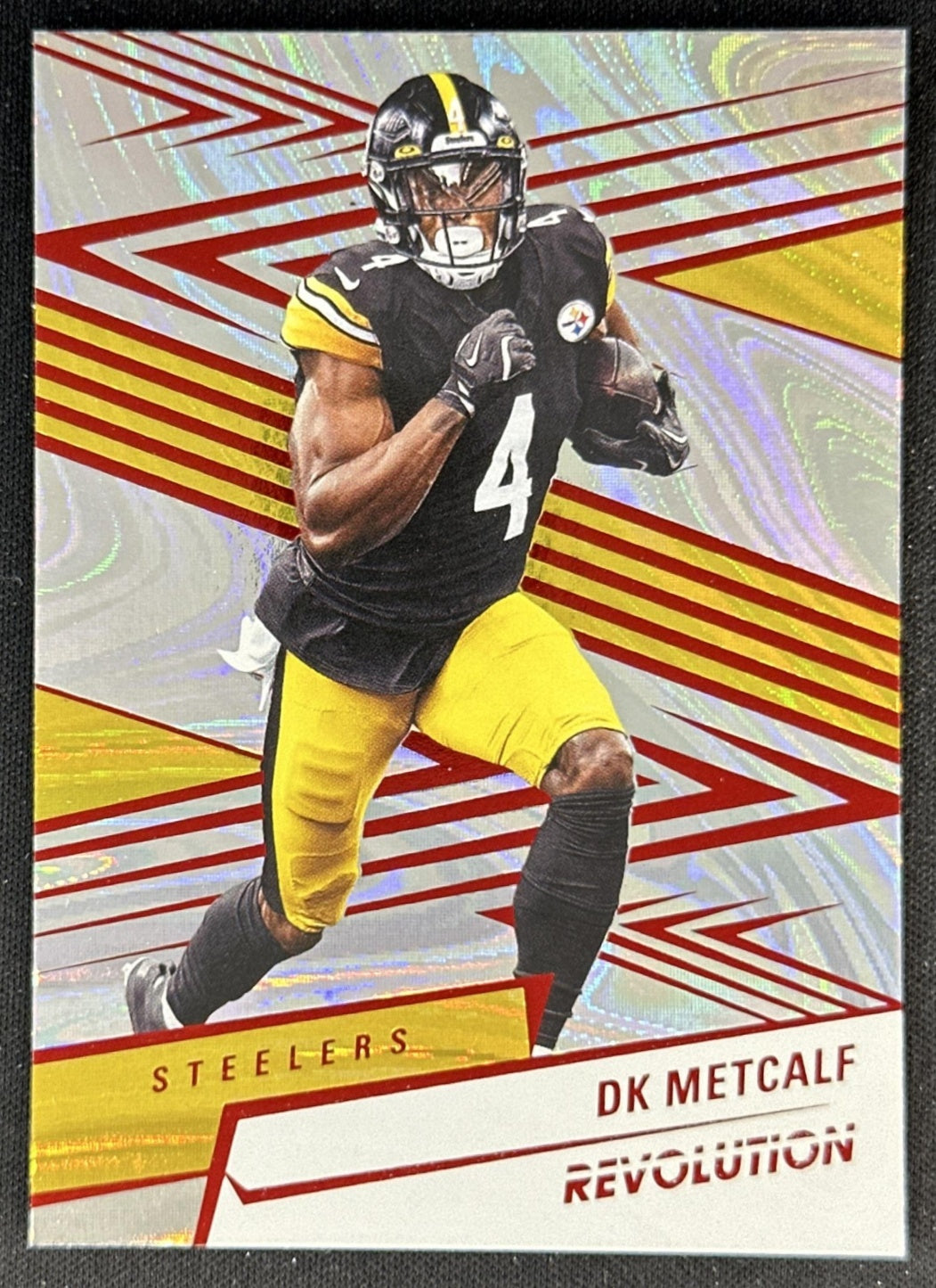 DK Metcalf 2025 Panini Revolution Red Swirl Steelers