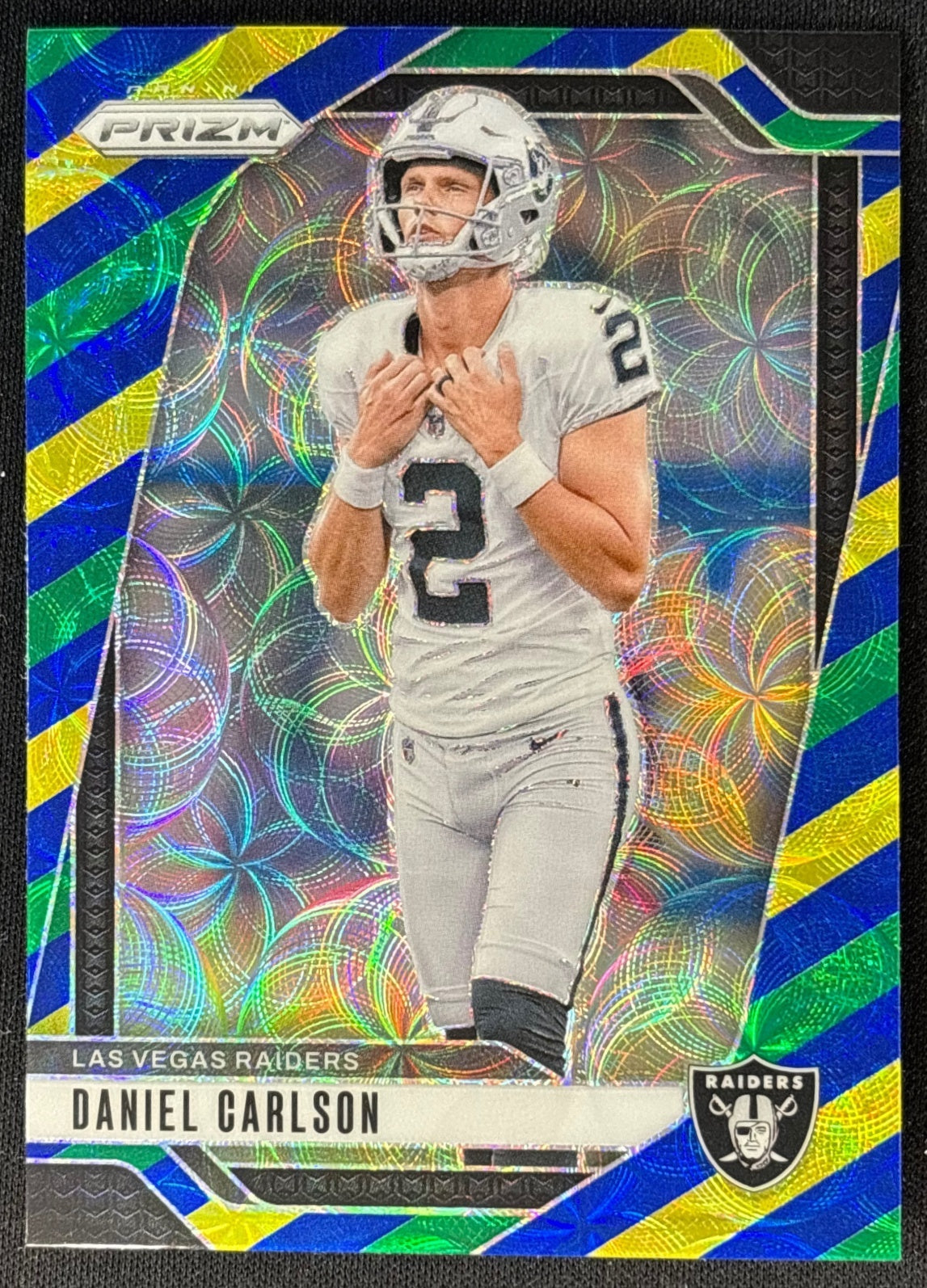 Daniel Carlson 2024 Prizm Choice Blue Yellow and Green Raiders front | Wayne Collection