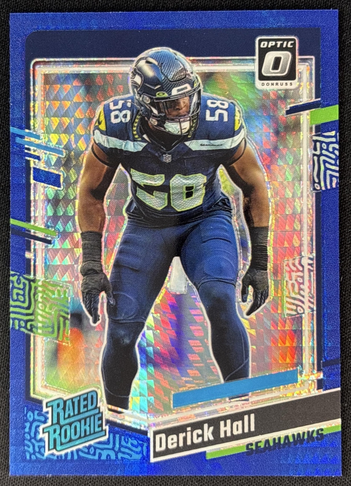 Derick Hall 2023 Panini Donruss Optic Blue Hyper Prizm Seahawks