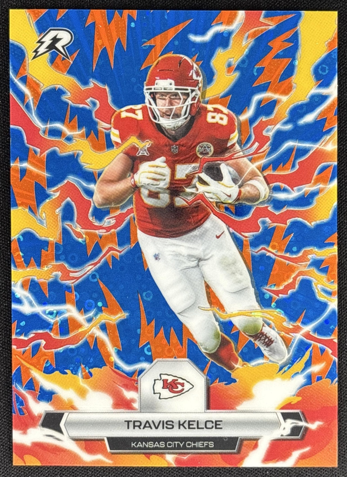 Travis Kelce 2025 Topps Resurgence Blue and Orange Spark Refractor Chiefs