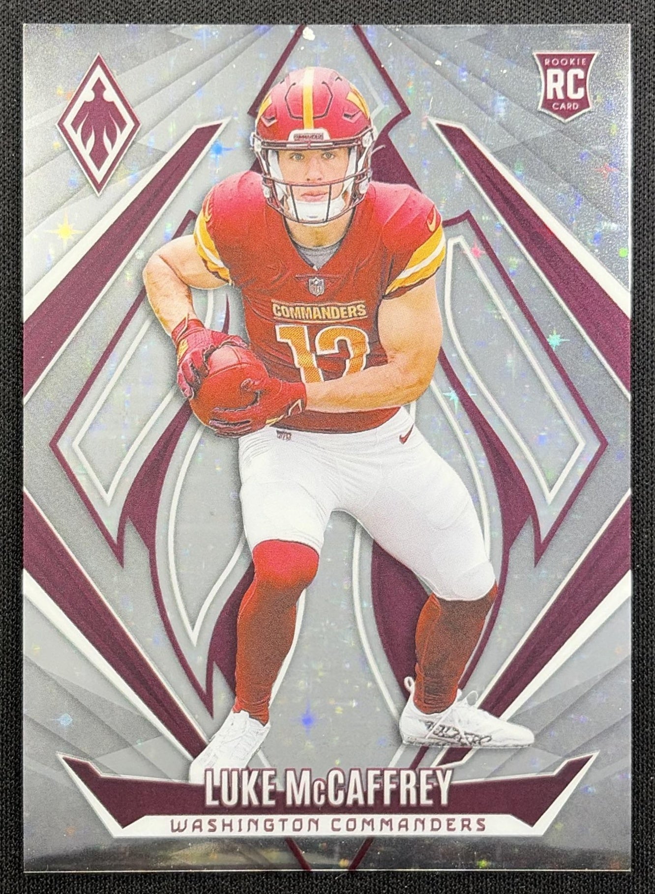 Luke McCaffrey 2024 Panini Phoenix Stars /180 Commanders