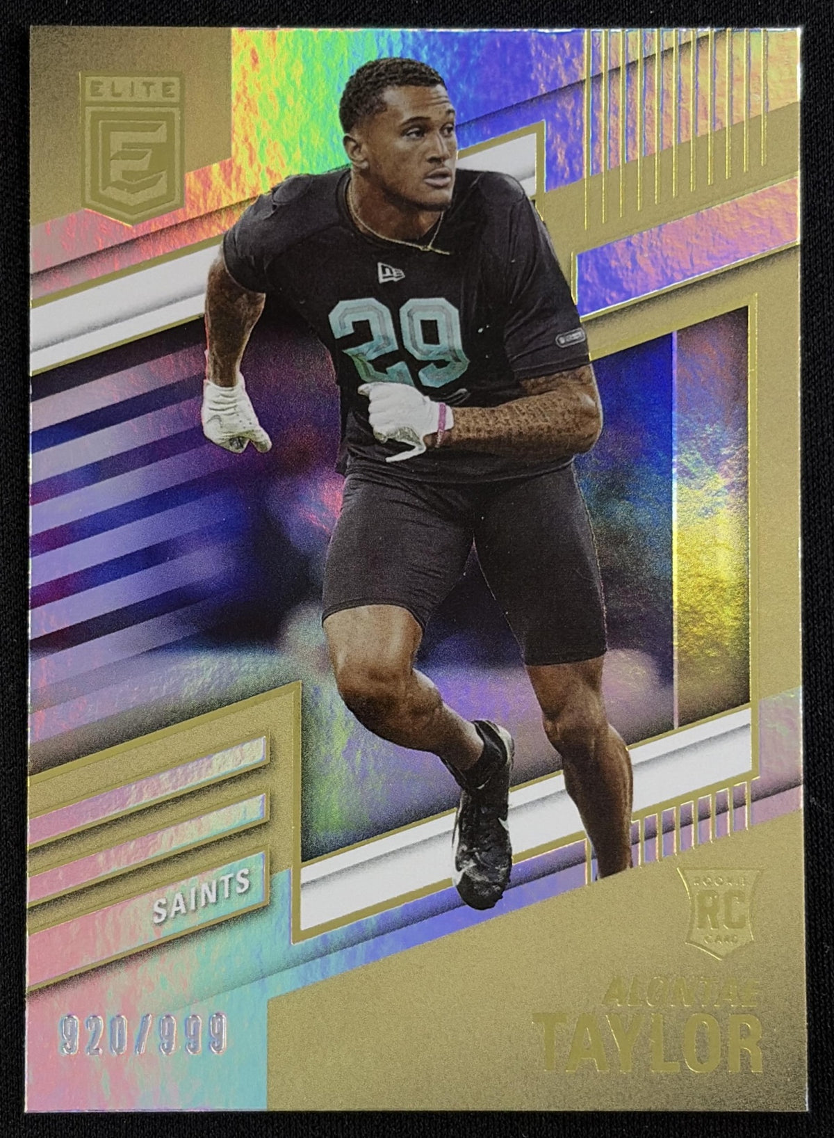 Front of Alontae Taylor 2022 Panini Donruss Elite /999 Saints sports trading card