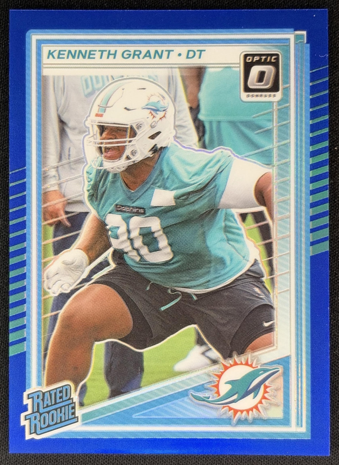 Kenneth Grant 2025 Panini Donruss Optic Rated Rookie Blue Prizm /249 Dolphins